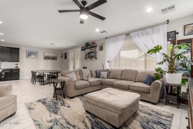 a view of yard with a slide and a child swing