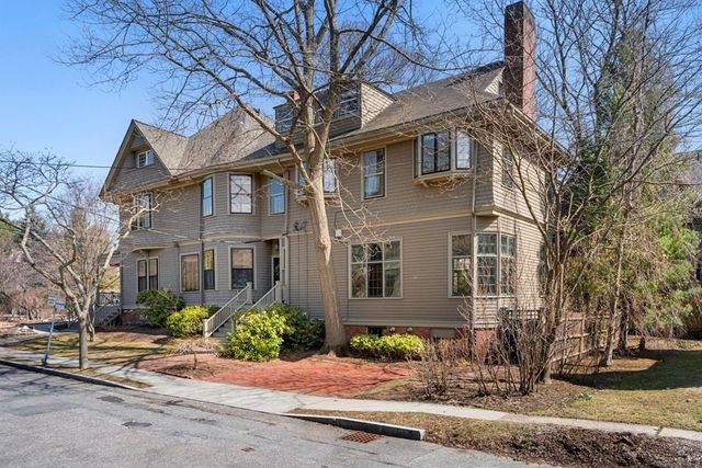 a front view of a building with street view