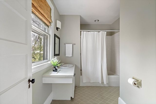 a view of storage and utility room with washer and dryer