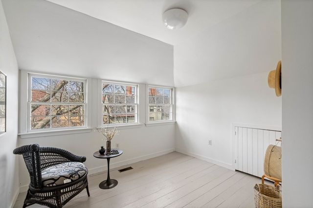a bathroom with a sink toilet and a mirror