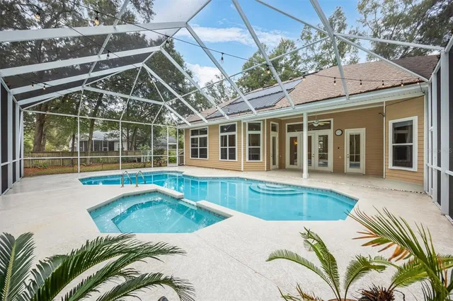 a view of a house with swimming pool