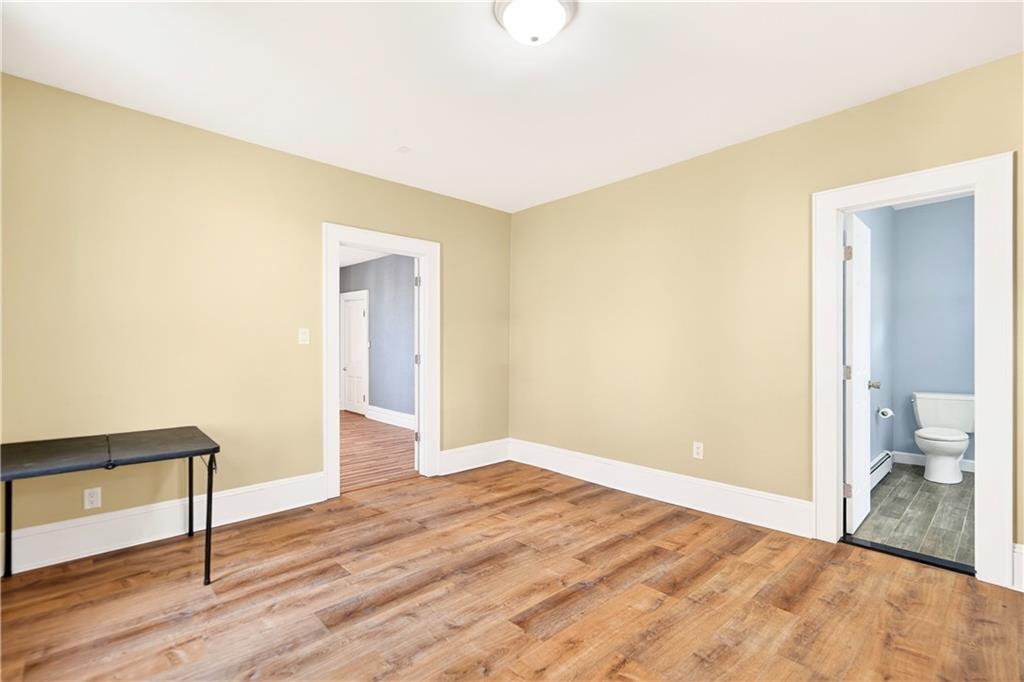 422 West 7th Avenue Tarentum, PA 15084 - Photo 32 of 50 a view of an empty room and wooden floor