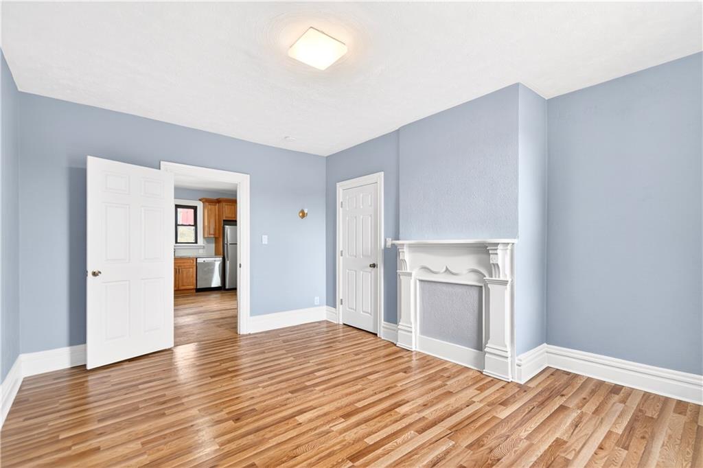422 West 7th Avenue Tarentum, PA 15084 - Photo 36 of 50 a view of a kitchen with wooden floor and a sink