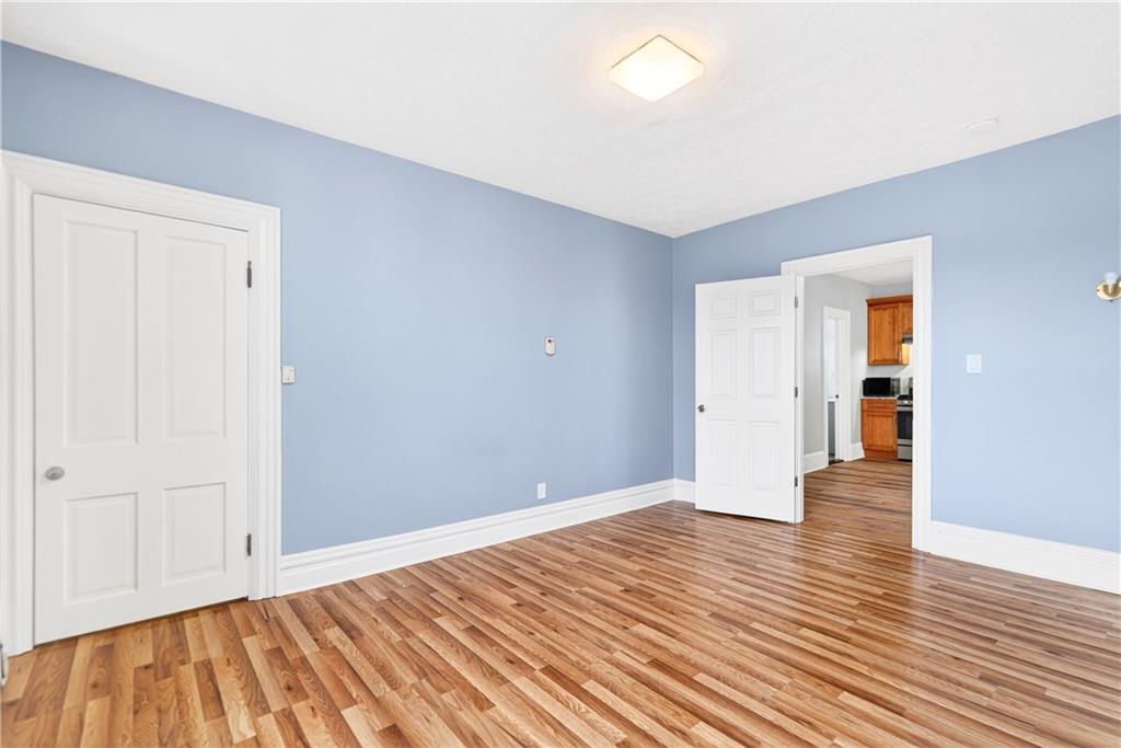 422 West 7th Avenue Tarentum, PA 15084 - Photo 37 of 50 a view of an empty room with wooden floor