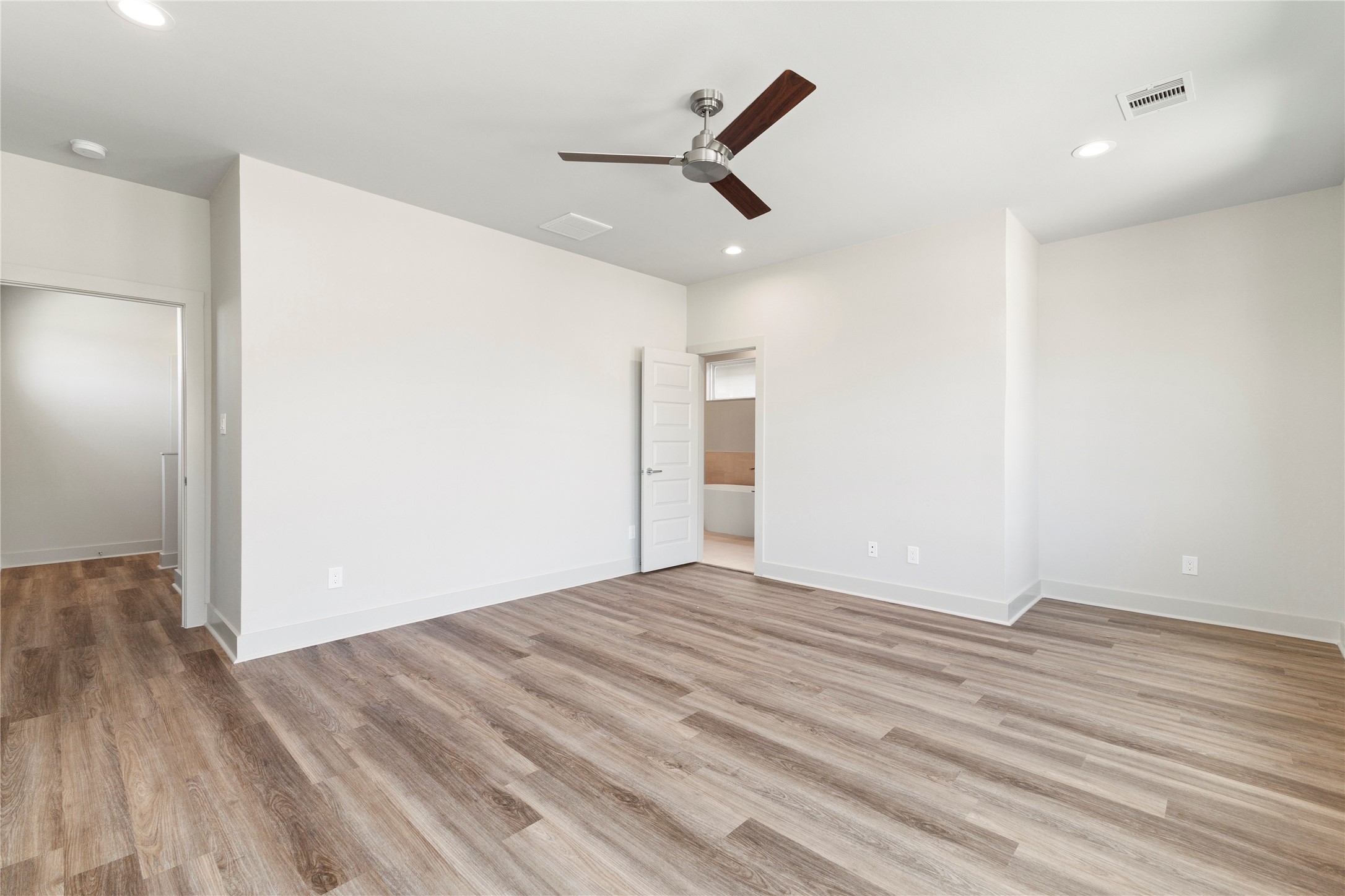 5726 Rucio Lane Houston, TX 77092 - Photo 13 of 30 a view of empty room with wooden floor