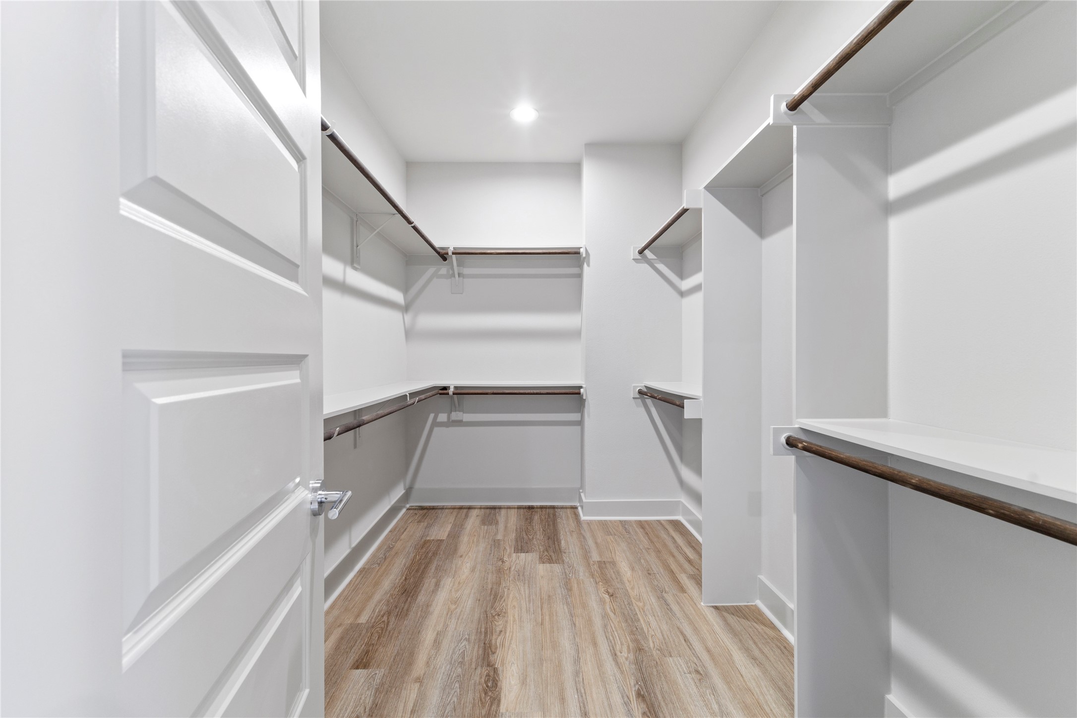 5726 Rucio Lane Houston, TX 77092 - Photo 17 of 30 a view of entryway with wooden floor