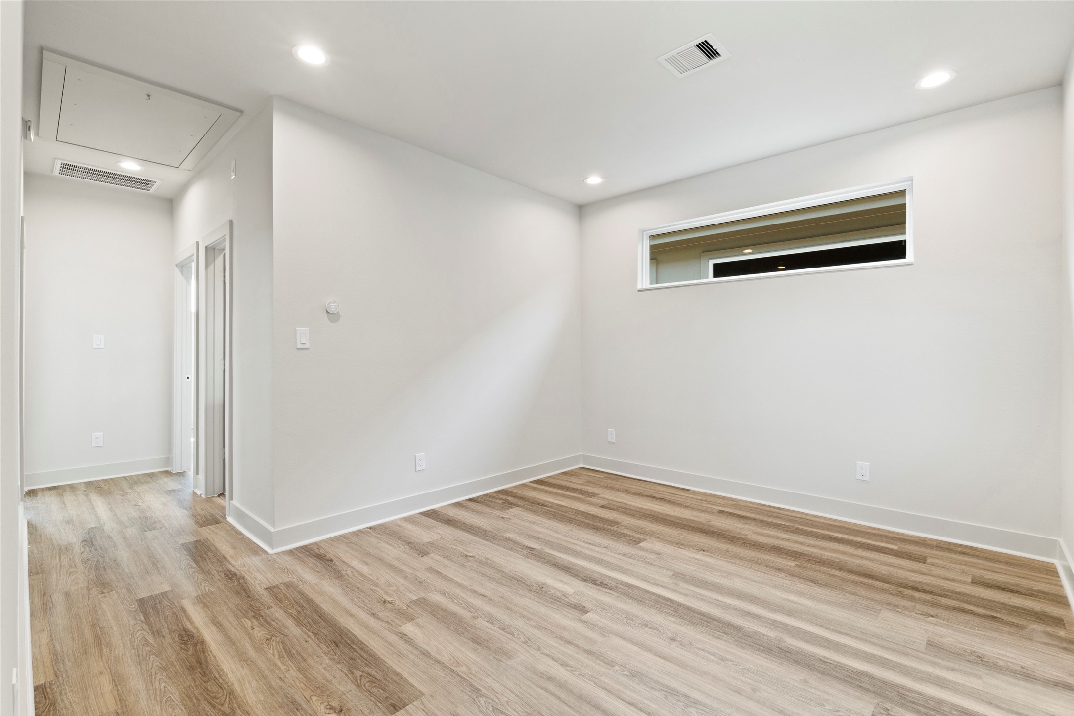 5726 Rucio Lane Houston, TX 77092 - Photo 19 of 30 a view of a livingroom with wooden floor