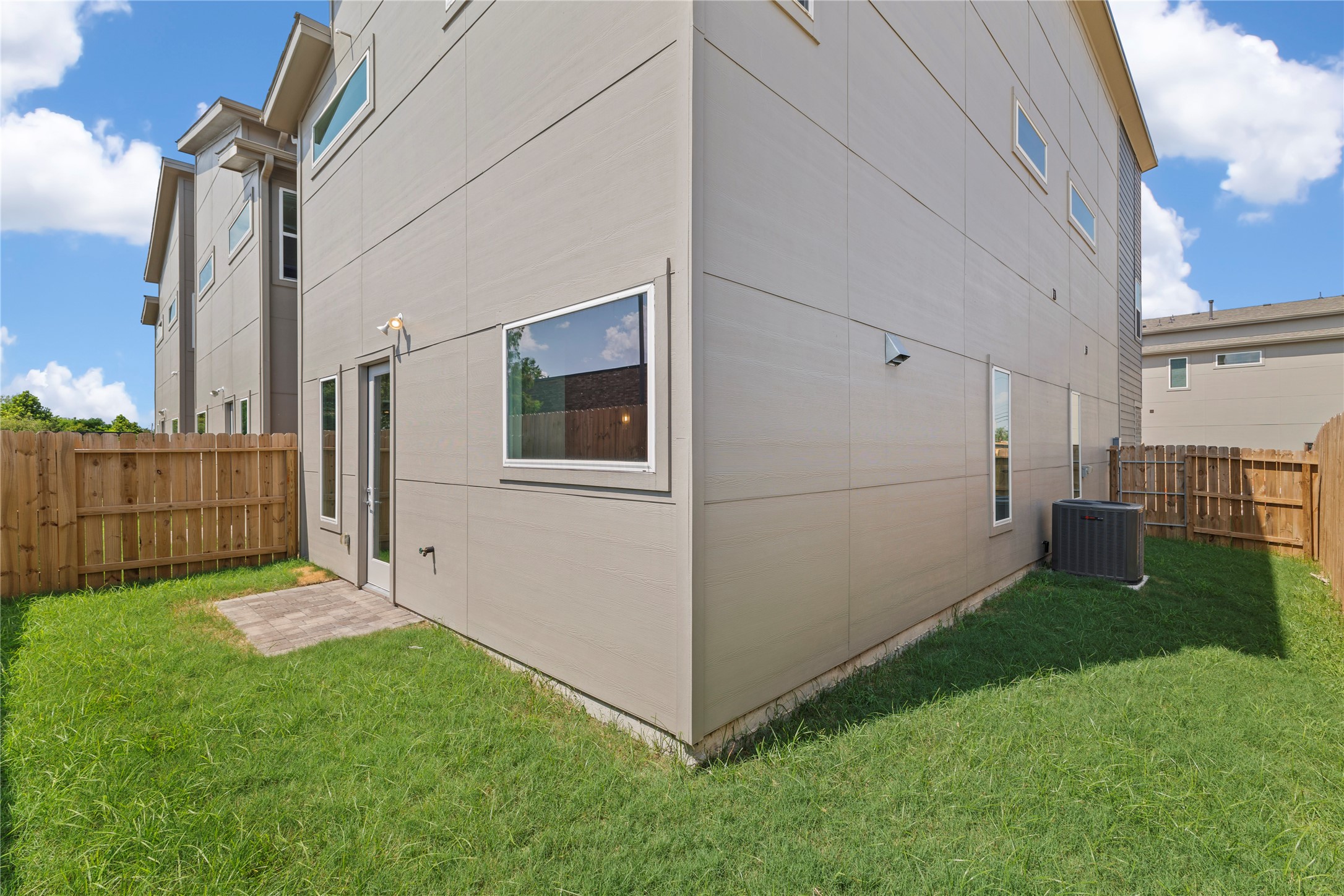 5726 Rucio Lane Houston, TX 77092 - Photo 25 of 30 a view of backyard with barbeque grill potted plants and wooden fence