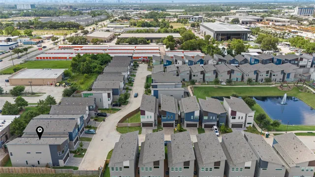an aerial view of a house with a garden