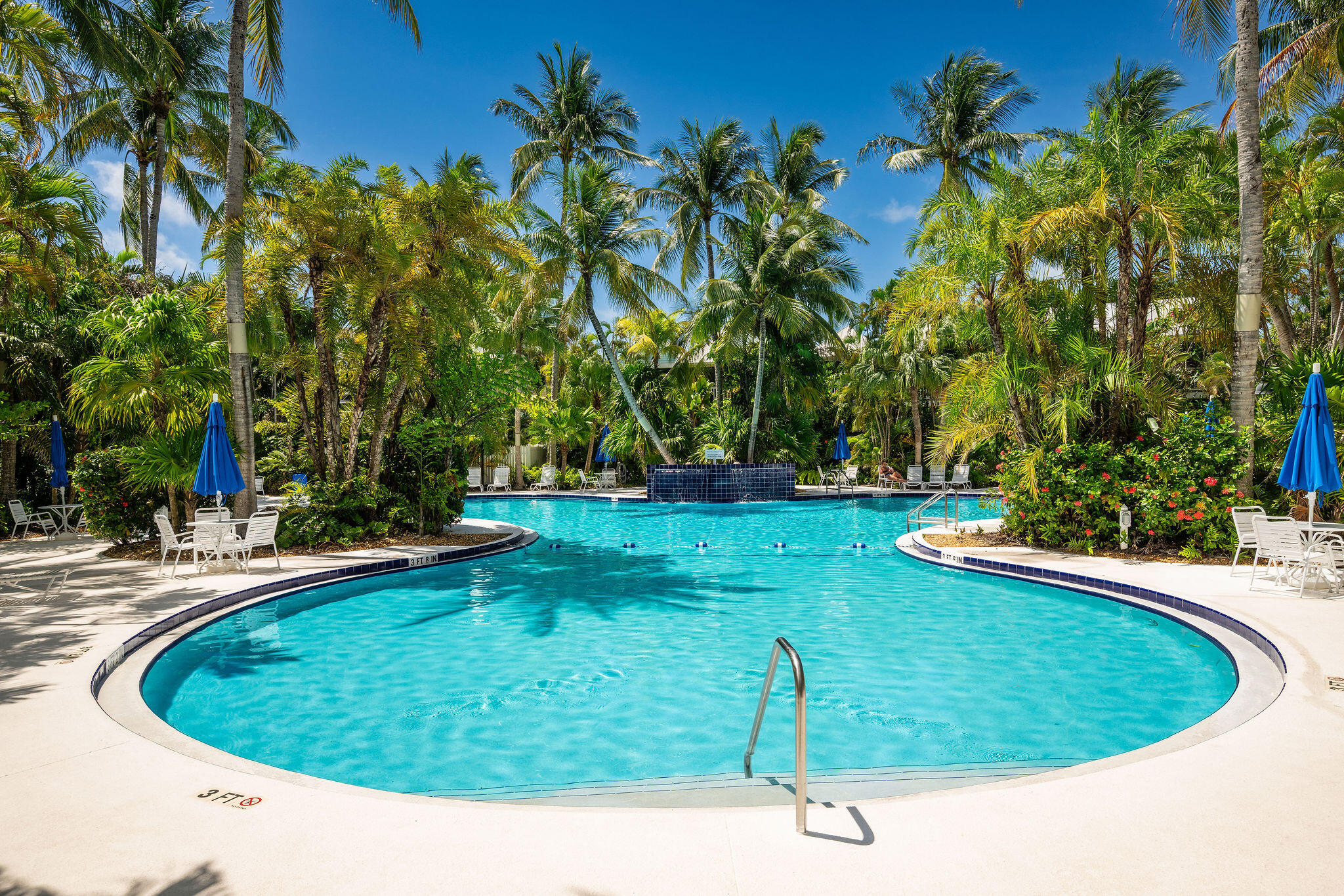 1 Spoonbill Way Key West, FL 33040 - Photo 36 of 38 a view of a swimming pool with a sitting area