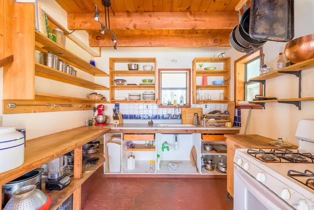 a view of balcony with wooden floor
