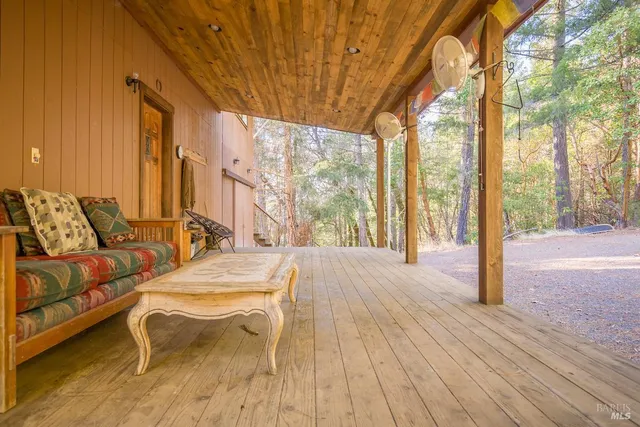 a view of a building with a cars park