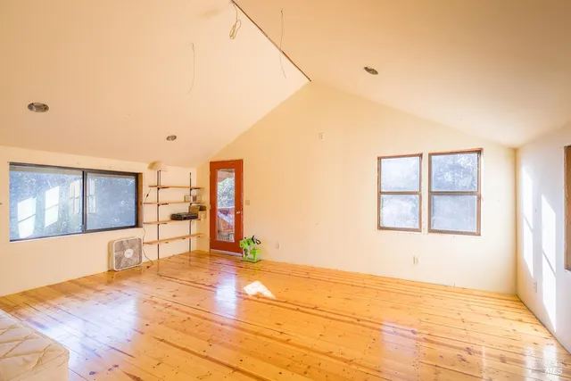 a view of an chairs and table in the balcony
