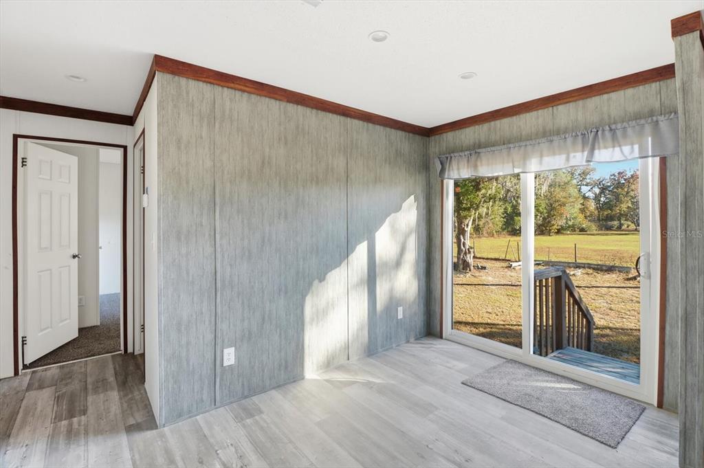 6919 South Sorrell Avenue Homosassa, FL 34446 - Photo 12 of 30 a view of an empty room with a window