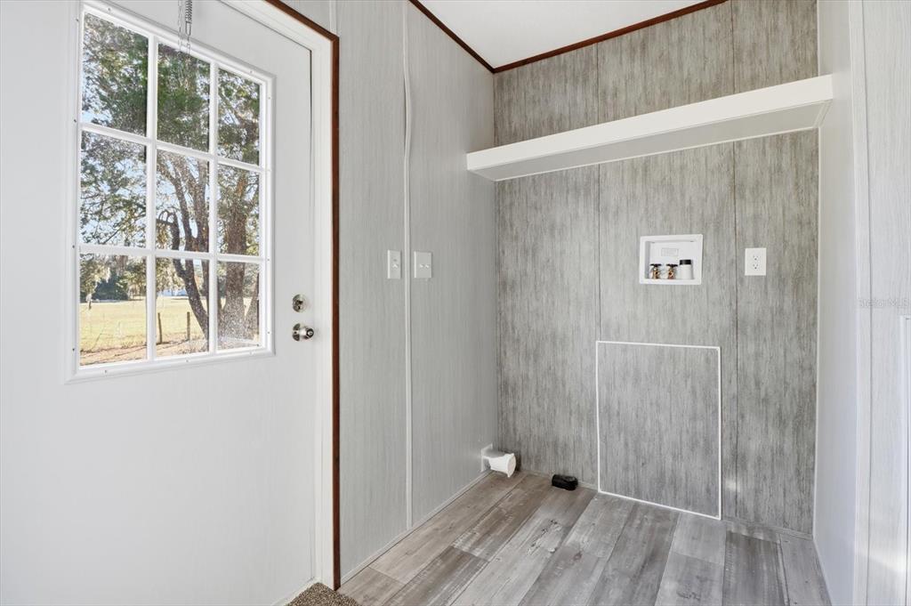 6919 South Sorrell Avenue Homosassa, FL 34446 - Photo 29 of 30 a view of a bathroom with a glass door