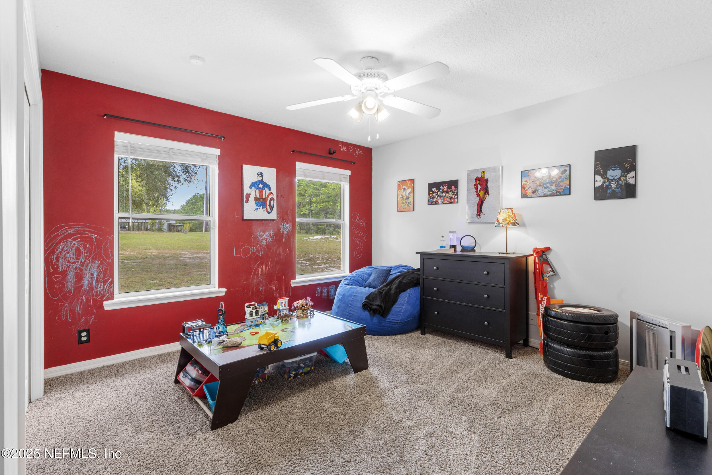 7557 Alameda Way Keystone Heights, FL 32656 - Photo 15 of 40 a living room with furniture and a window