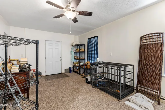 a bedroom with furniture