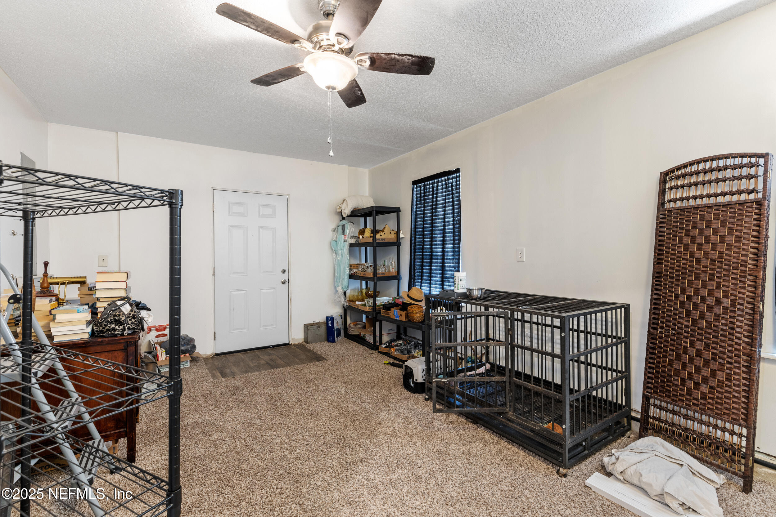 7557 Alameda Way Keystone Heights, FL 32656 - Photo 23 of 40 a bedroom with furniture