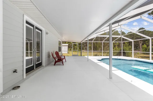 a view of house with porch and outdoor space