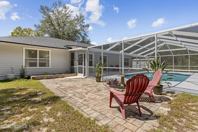 a view of a lounge chairs in the patio
