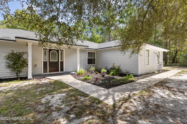 a front view of house with yard