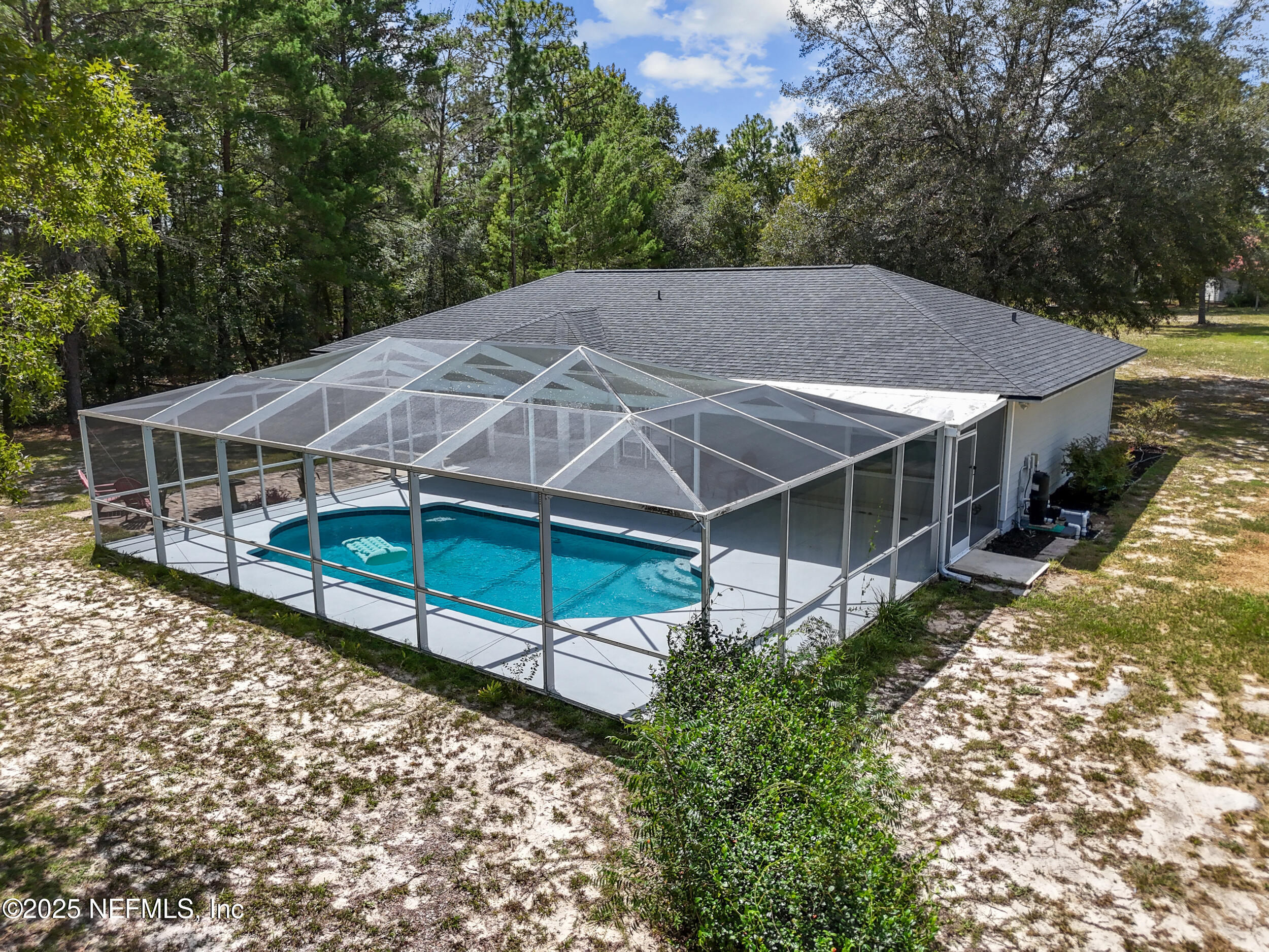 7557 Alameda Way Keystone Heights, FL 32656 - Photo 35 of 40 a view of a house with a yard