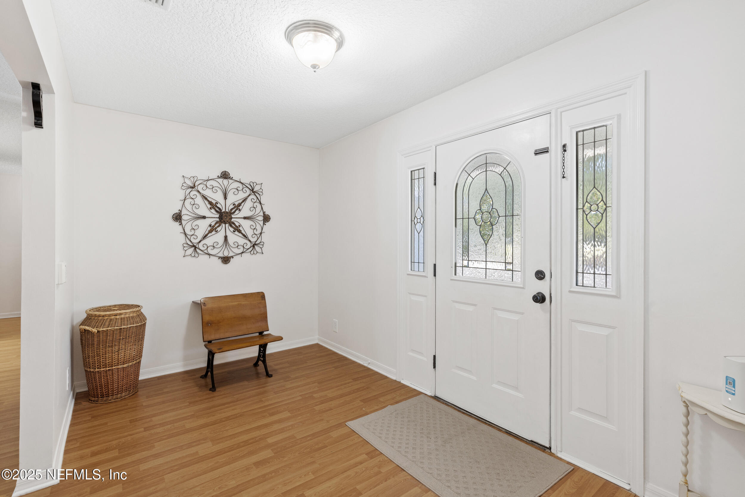 7557 Alameda Way Keystone Heights, FL 32656 - Photo 5 of 40 a view of a livingroom with workspace and a couch