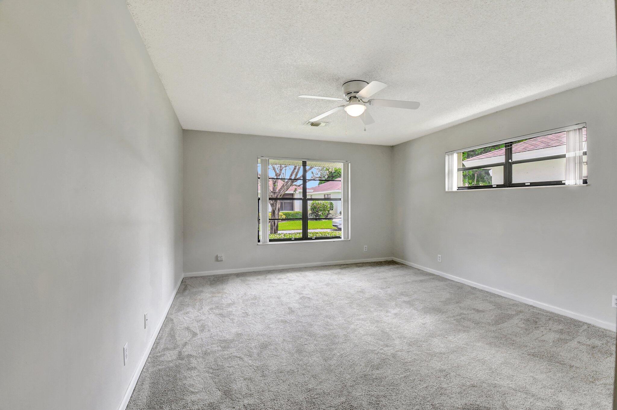9805 Walnut Tree Way, Unit A Boynton Beach, FL 33436 - Photo 20 of 53 Primary Bedroom