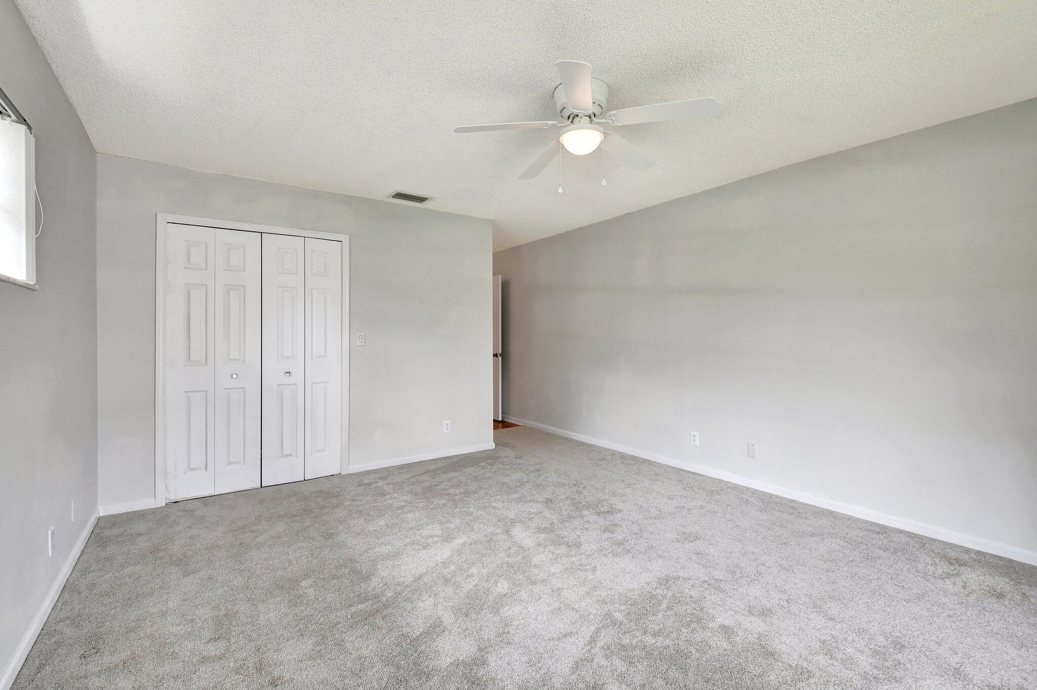 9805 Walnut Tree Way, Unit A Boynton Beach, FL 33436 - Photo 22 of 53 Primary Bedroom
