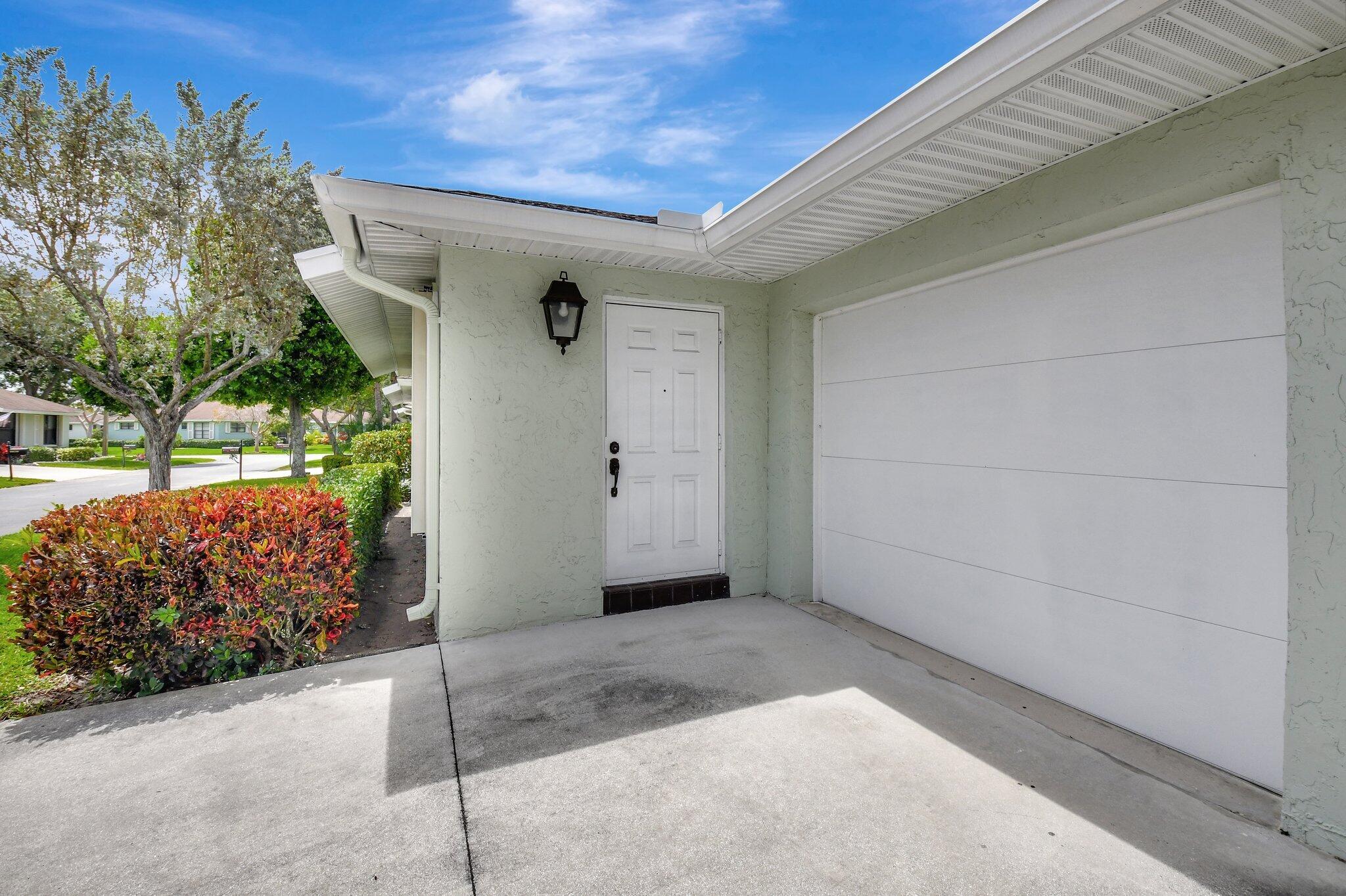 9805 Walnut Tree Way, Unit A Boynton Beach, FL 33436 - Photo 46 of 53 Front Entrance