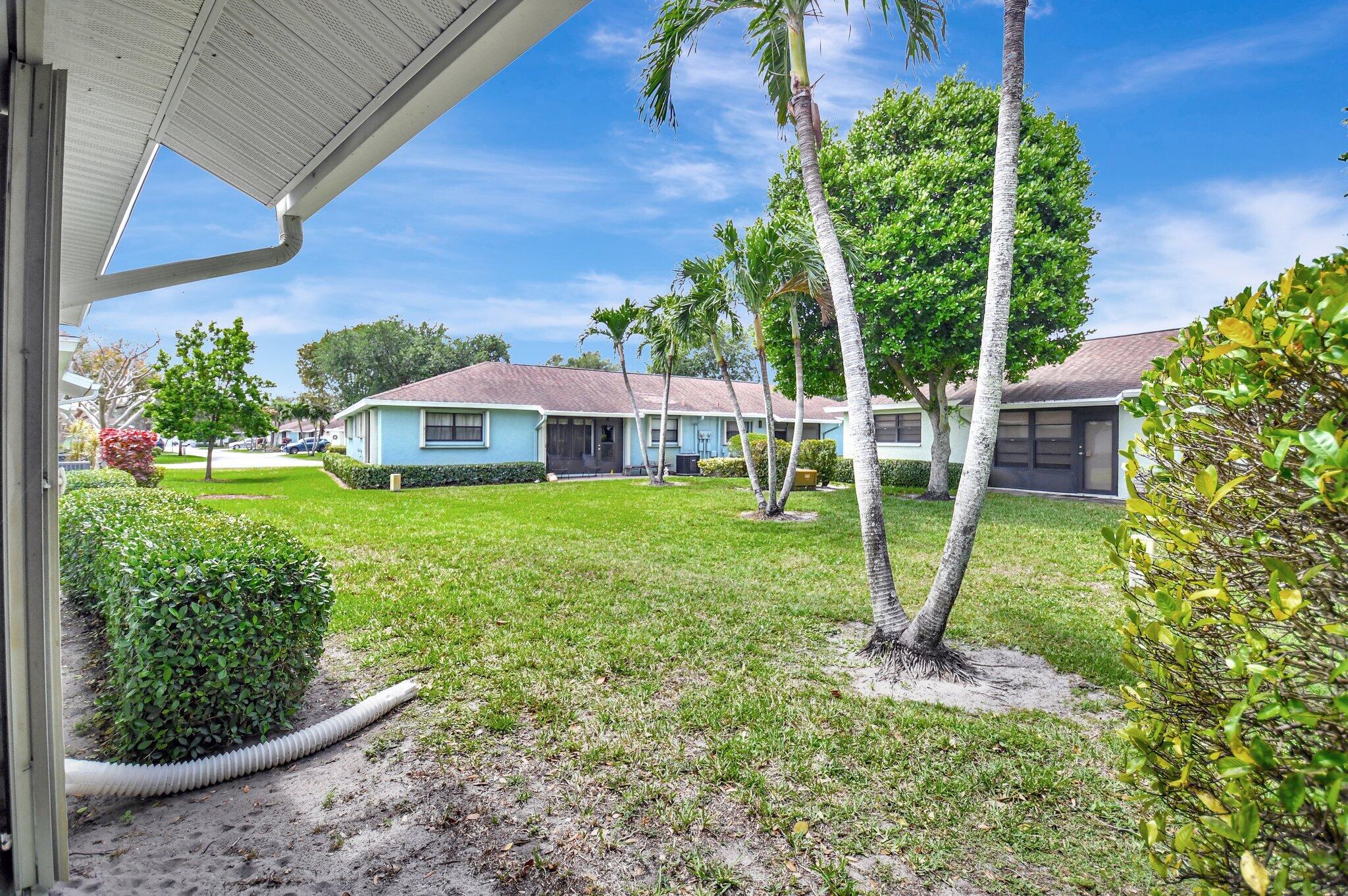 9805 Walnut Tree Way, Unit A Boynton Beach, FL 33436 - Photo 48 of 53 Back Exterior