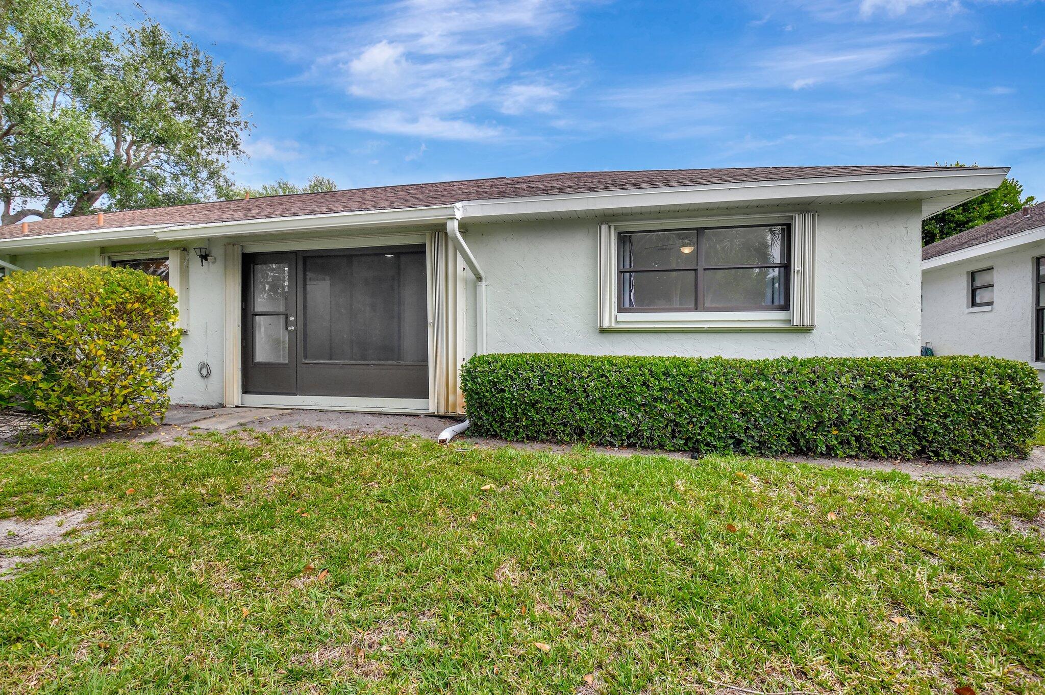 9805 Walnut Tree Way, Unit A Boynton Beach, FL 33436 - Photo 49 of 53 Back Exterior