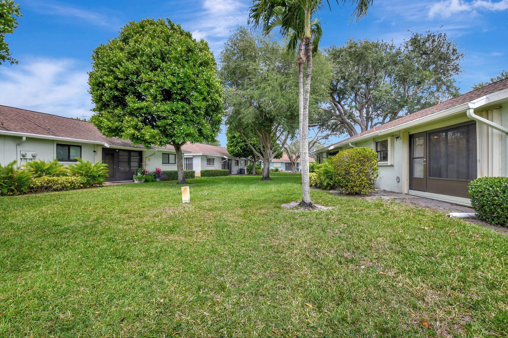 9805 Walnut Tree Way, Unit A Boynton Beach, FL 33436 - Photo 51 of 53 Back Exterior