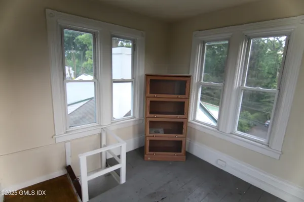 a view of a hallway with closet area