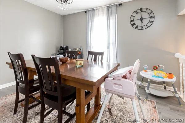 a view of a dining room with furniture