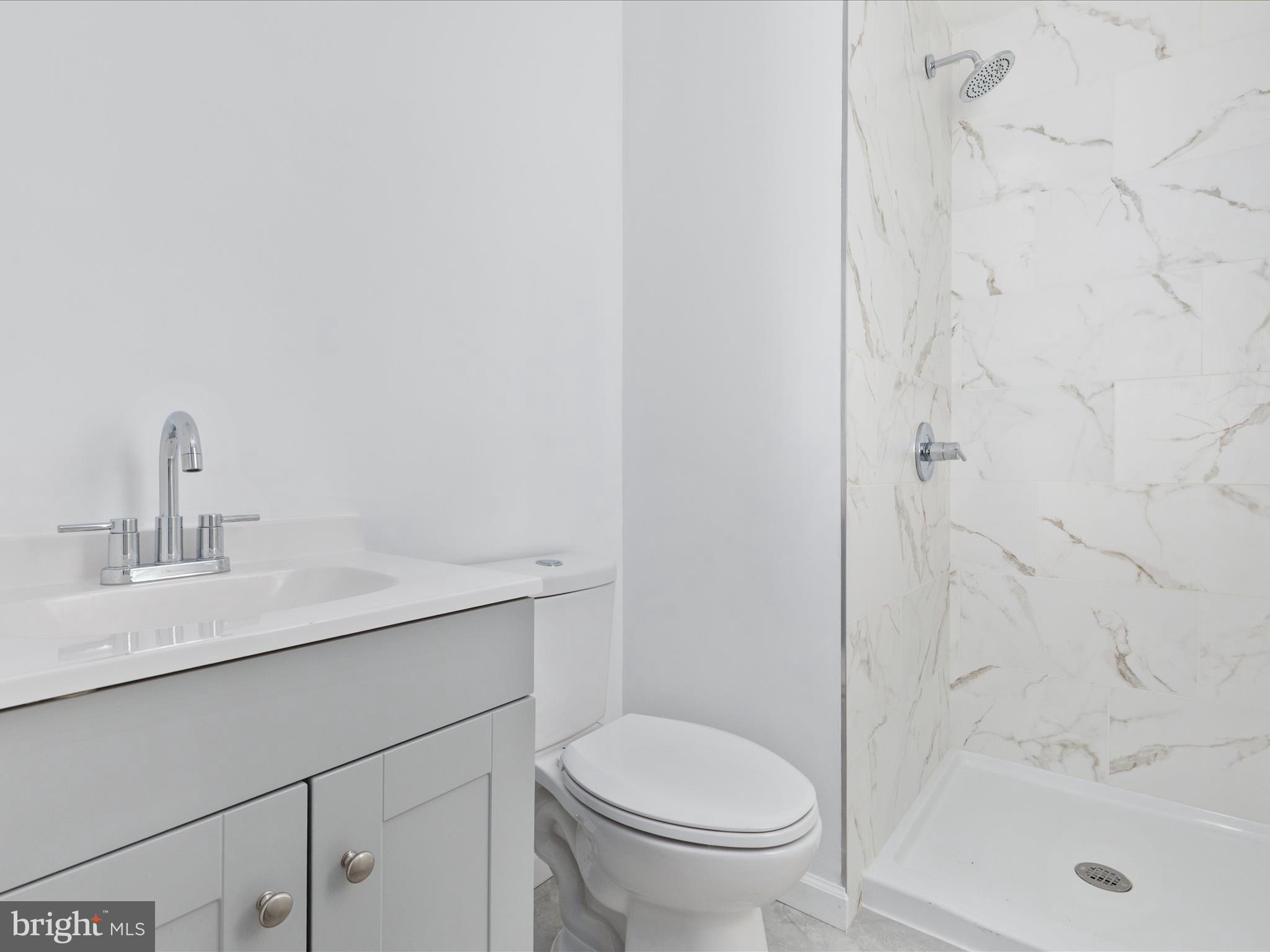 10214 Unique Trail Rixeyville, VA 22737 - Photo 21 of 48 a bathroom with a sink toilet and shower
