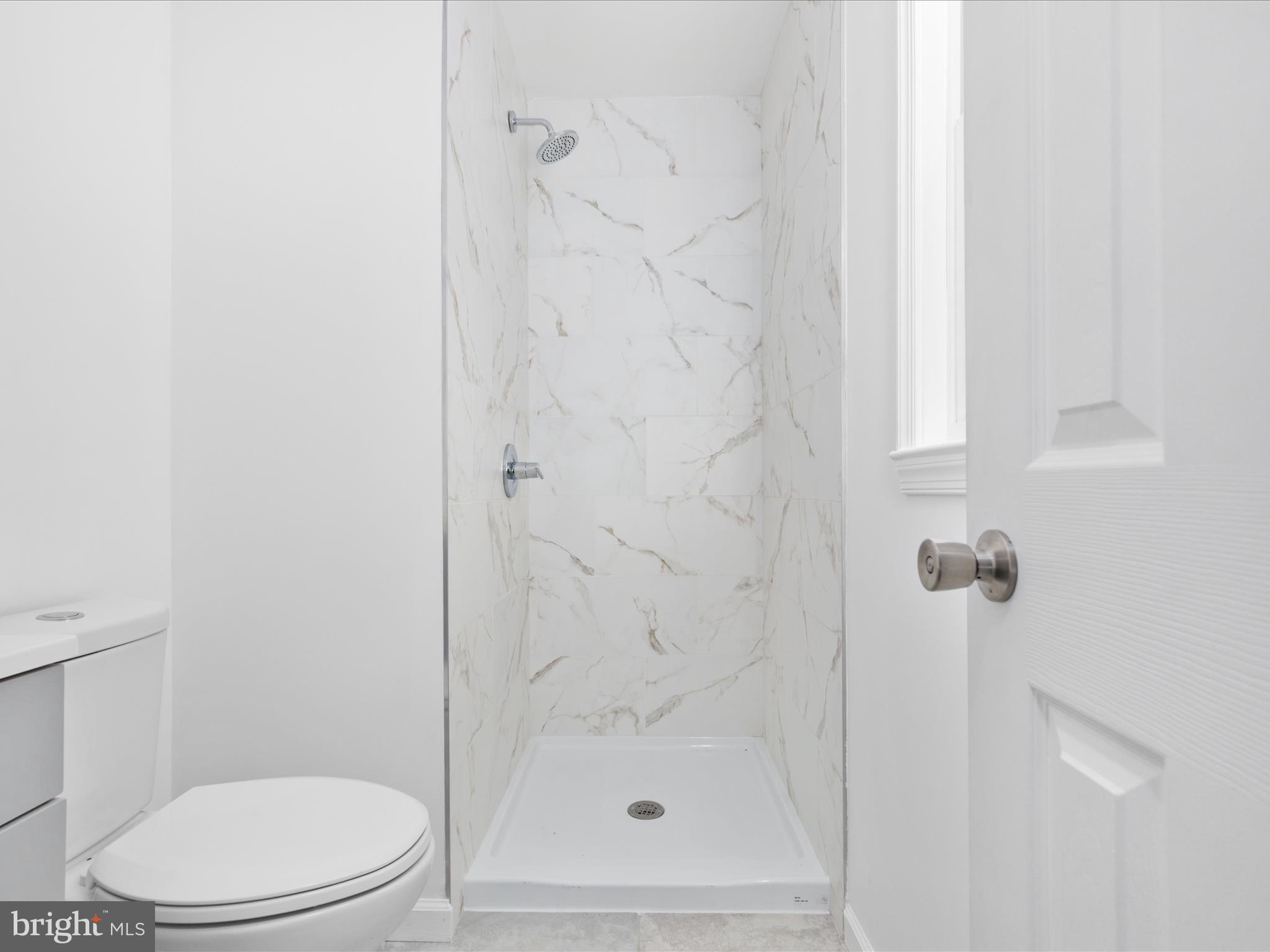 10214 Unique Trail Rixeyville, VA 22737 - Photo 22 of 48 a bathroom with a shower and toilet