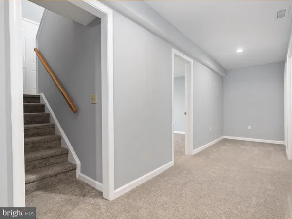 a view of an entryway with stairs