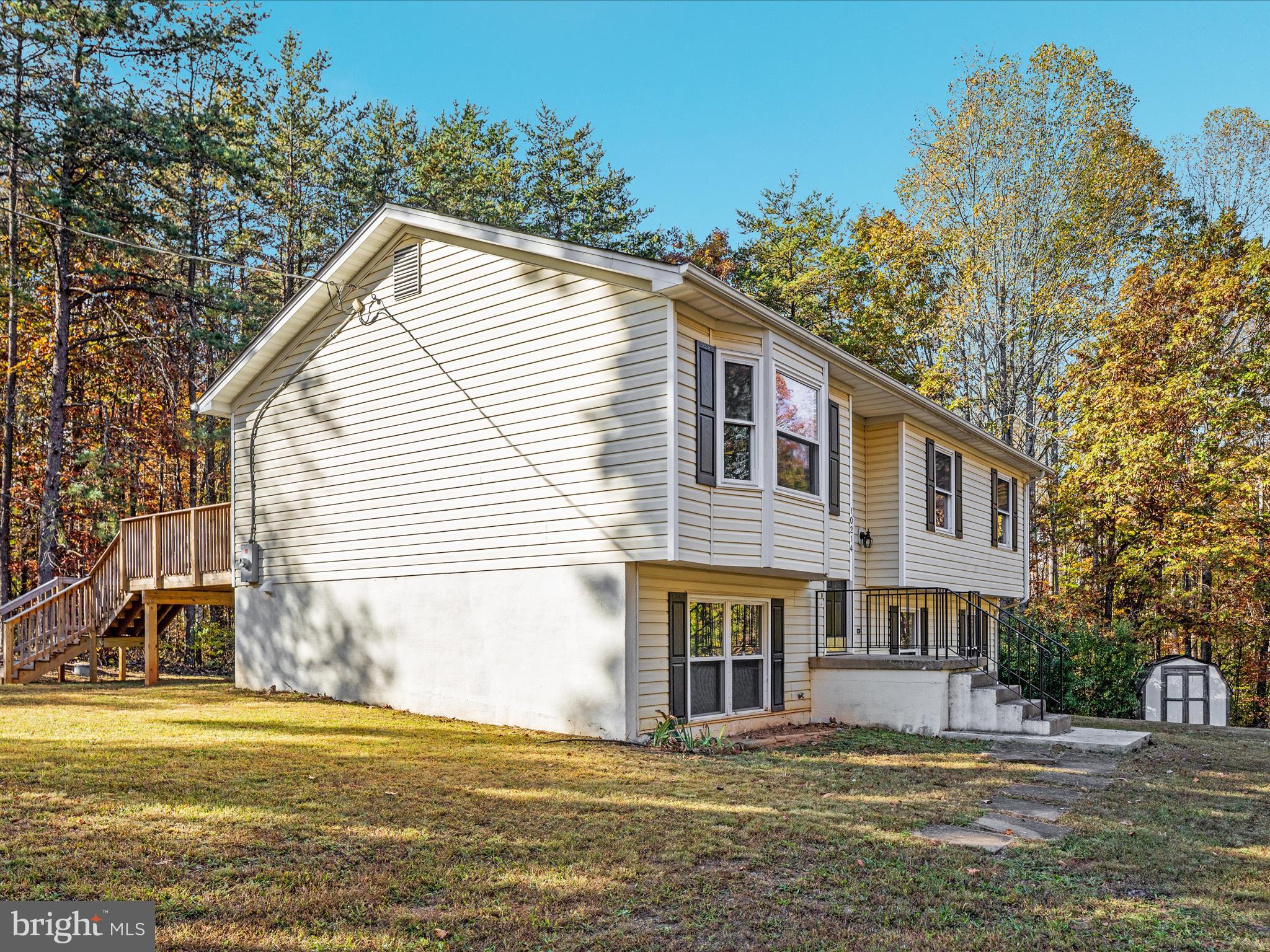 10214 Unique Trail Rixeyville, VA 22737 - Photo 43 of 48 a view of a house with a yard