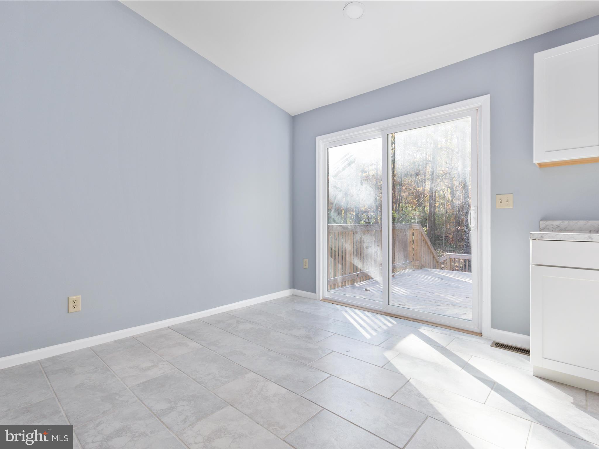 10214 Unique Trail Rixeyville, VA 22737 - Photo 7 of 48 a view of an empty room with a window