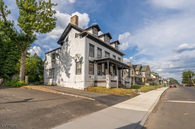 a view of a building with a street