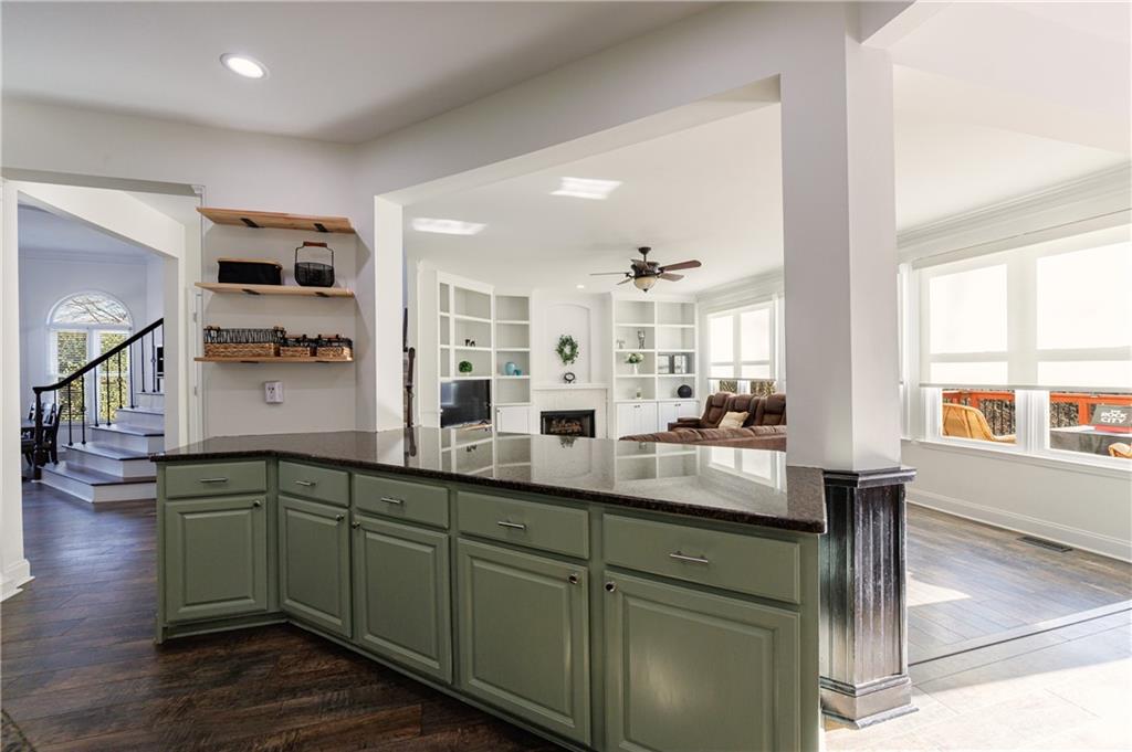 6010 Masters Club Drive Suwanee, GA 30024 - Photo 16 of 82 a kitchen with lots of counter space and a window