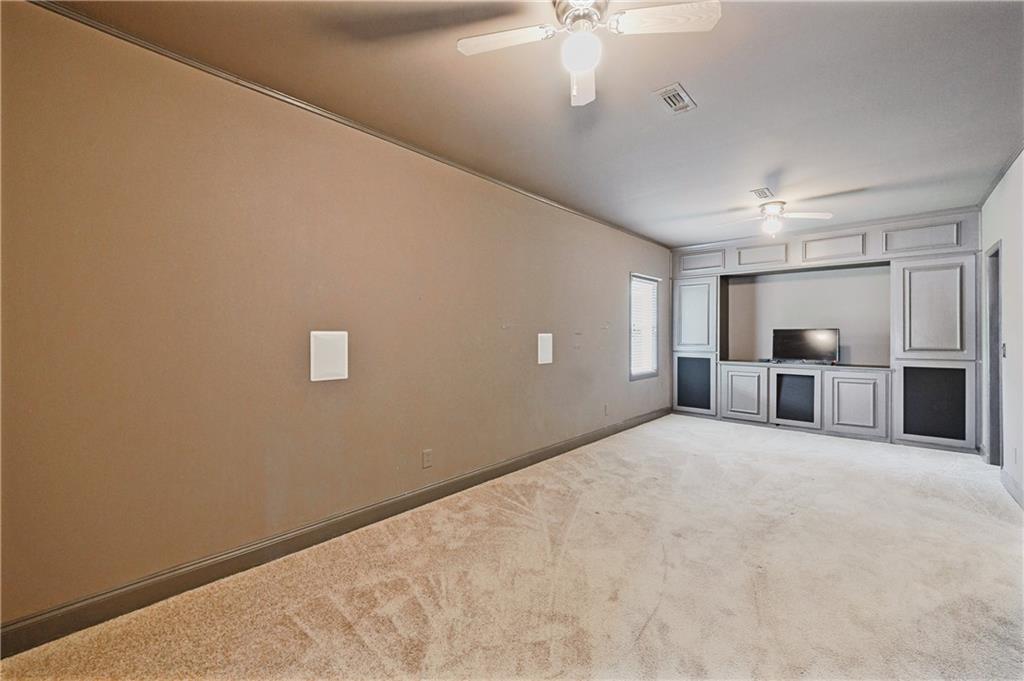 6010 Masters Club Drive Suwanee, GA 30024 - Photo 63 of 82 a view of a livingroom with an empty space