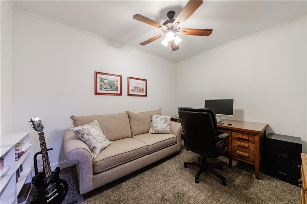 6010 Masters Club Drive Suwanee, GA 30024 - Photo 68 of 82 a living room with furniture