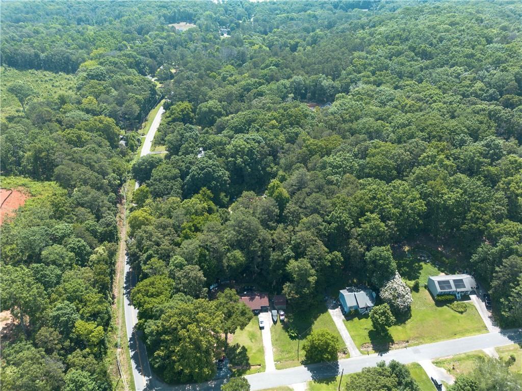 1217 Mission Road Southwest Cartersville, GA 30120 - Photo 11 of 18 an aerial view of residential house with yard and outdoor seating