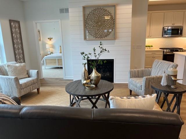 2062 South Links Avenue Butler, PA 16001 - Photo 4 of 21 a living room with furniture and a wooden floor