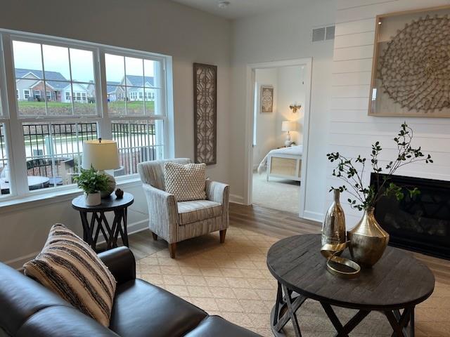 2062 South Links Avenue Butler, PA 16001 - Photo 6 of 21 a living room with furniture and a potted plant