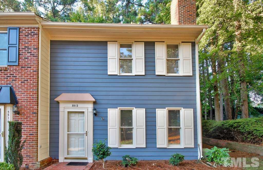5512 Hamstead Crossing Raleigh, NC 27612 - Photo 1 of 16 a front view of a house with a yard