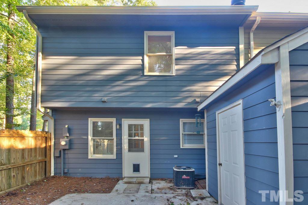 5512 Hamstead Crossing Raleigh, NC 27612 - Photo 14 of 16 a front view of a house with a yard