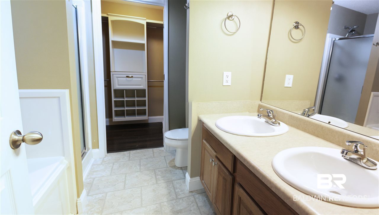 2255 Spring Grove North Mobile, AL 36695 - Photo 9 of 16 Master bath with his and her sinks/separate shower